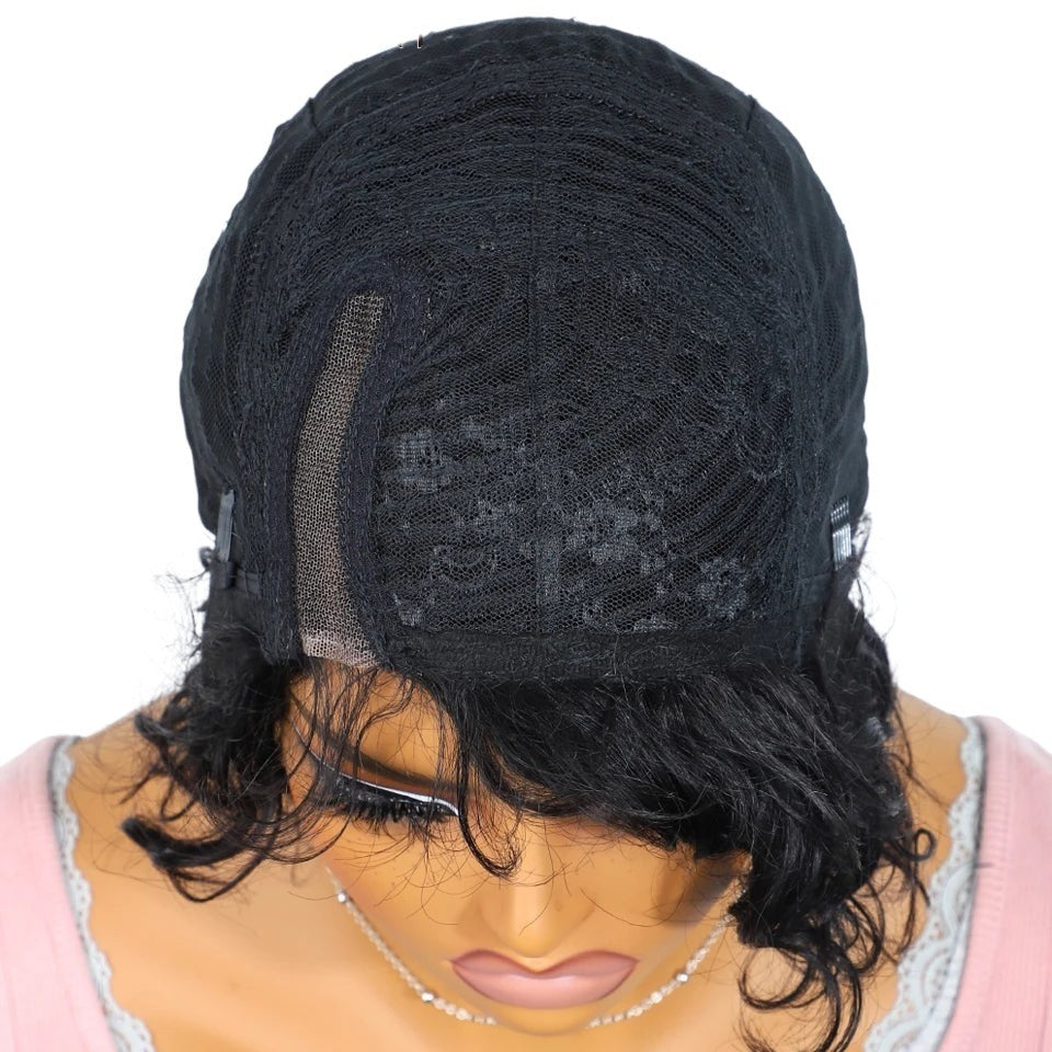 RitzWigs short pixie cut human hair wig with black lace cap construction and natural baby hair on a mannequin head