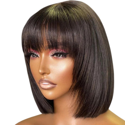 RitzWigs short straight black bob human hair wig with bangs worn by a mannequin with glamorous makeup