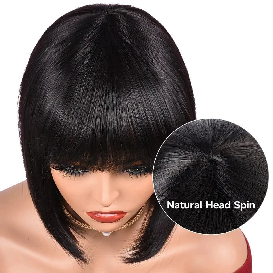 RitzWigs short straight black bob wig with bangs on a mannequin head showing a natural hair part