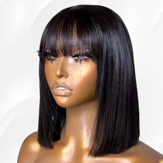 RitzWigs short straight black human hair bob wig with bangs on a mannequin head