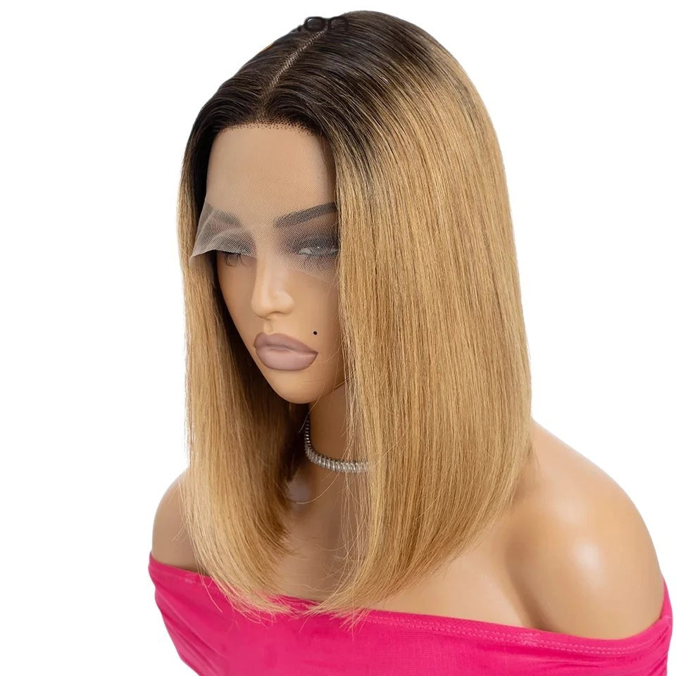 RitzWigs short straight bob lace front wig with dark roots and blonde hair on a mannequin head