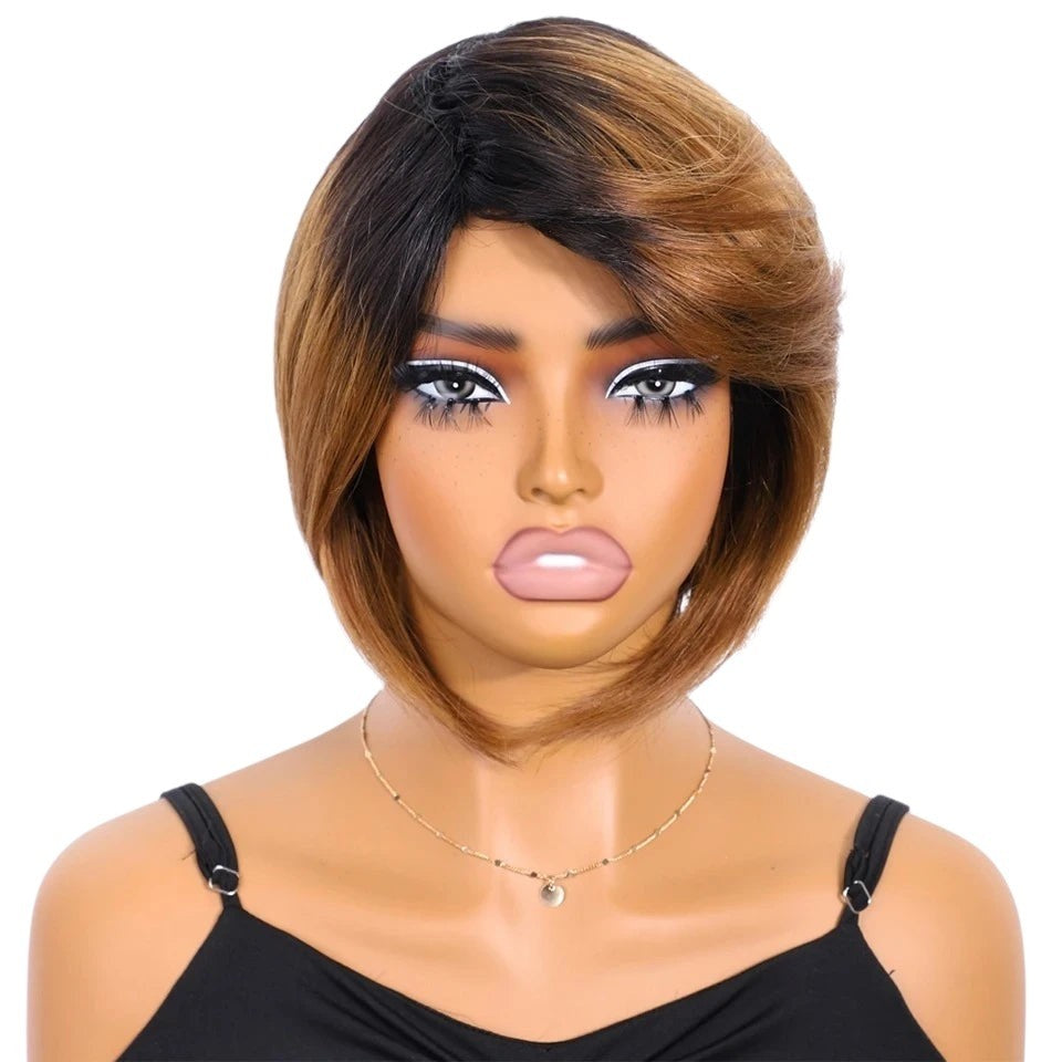 RitzWigs short straight bob human hair wig with dark roots and honey brown highlights on a mannequin head.
