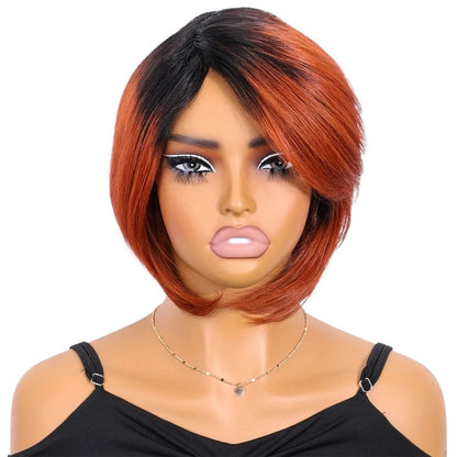 RitzWigs short straight bob human hair wig with bangs in a two-tone black and copper red colour on a mannequin head.