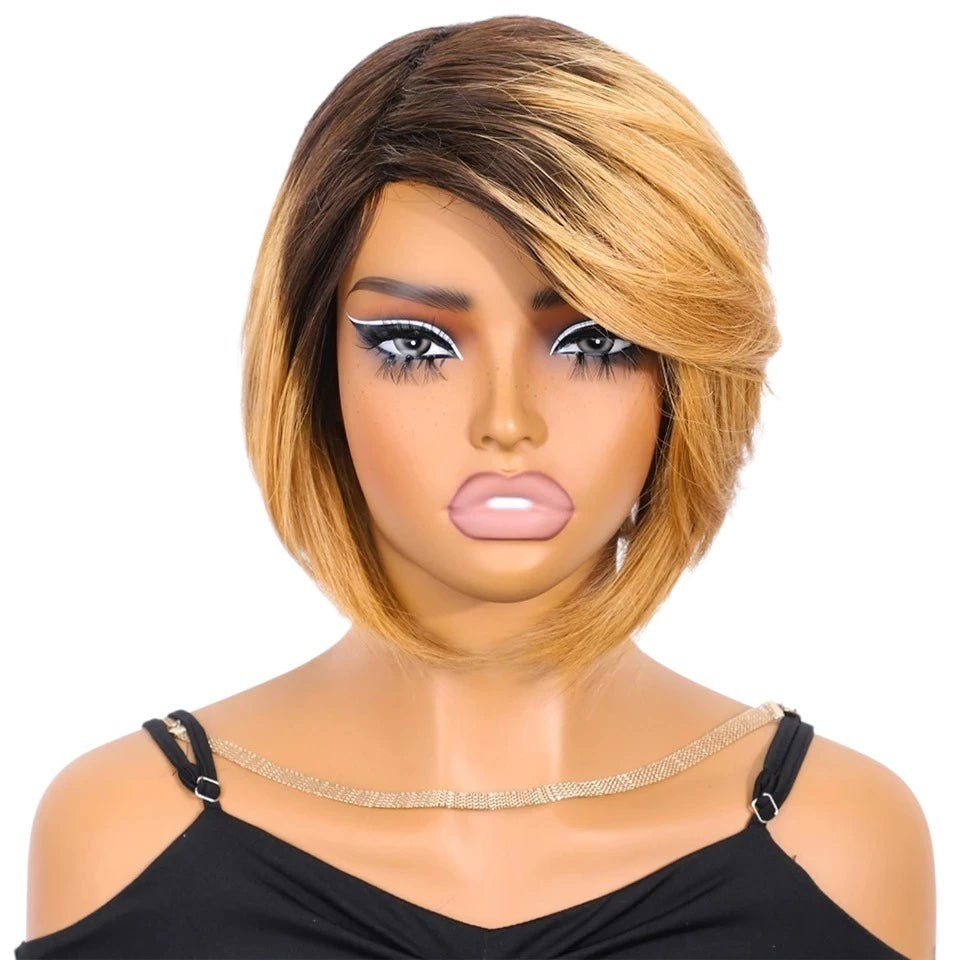 RitzWigs short straight bob human hair wig with side part and blonde ombre highlights on a mannequin