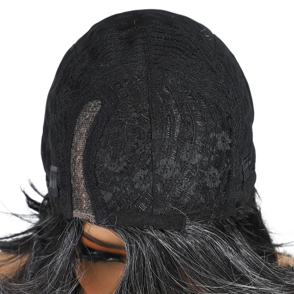 RitzWigs short straight bob wig interior view showing black lace cap construction and adjustable straps
