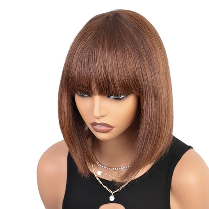 RitzWigs short straight bob human hair wig with bangs in a rich brown shade on a mannequin head