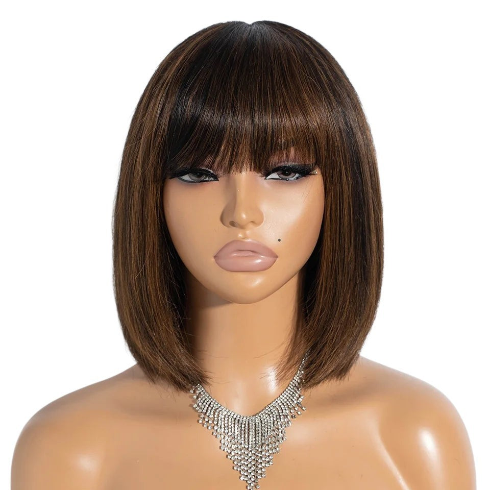RitzWigs short straight bob wig in natural brown with bangs on a mannequin wearing a silver necklace