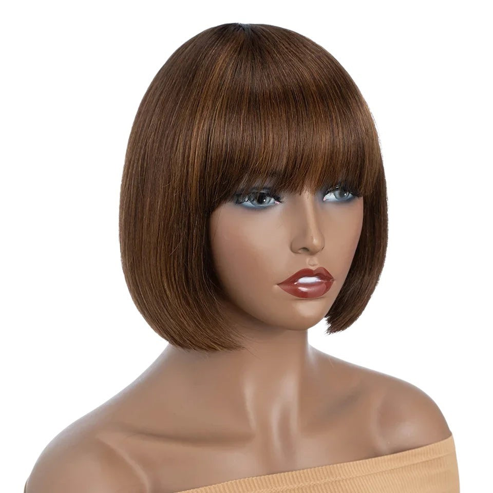 RitzWigs short straight brown bob wig with bangs on a mannequin head, made from Remy human hair.