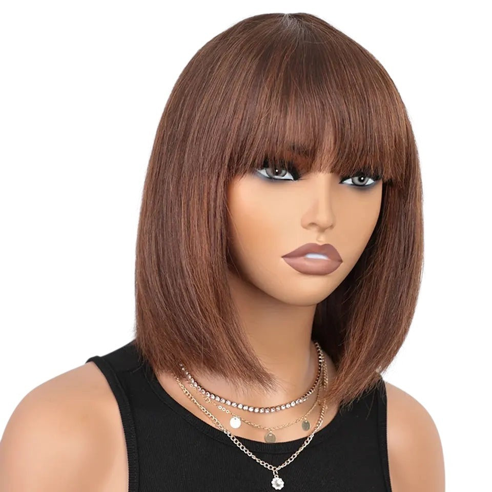 RitzWigs short straight brown bob human hair wig with bangs on a mannequin head