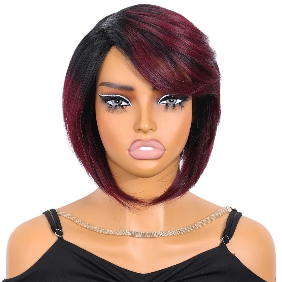 RitzWigs short straight Brazilian human hair bob wig with bangs in a black and burgundy ombre style on a mannequin