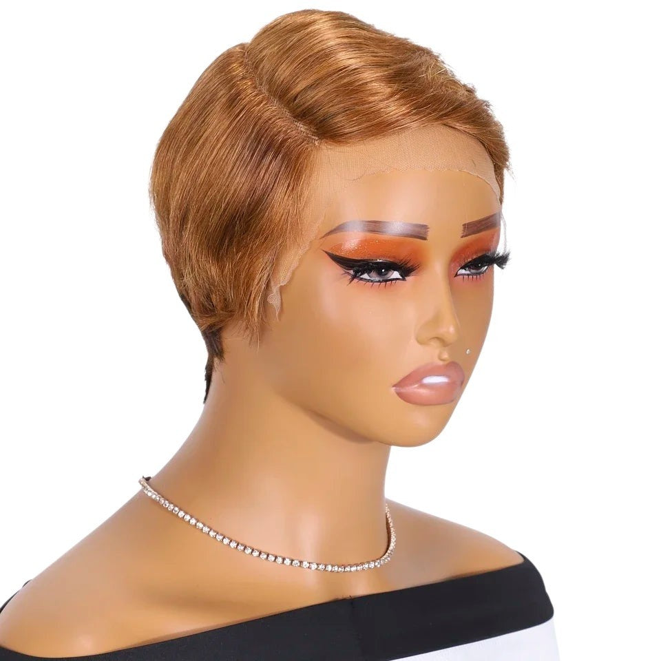 RitzWigs short straight pixie cut human hair wig in a light brown shade with a transparent lace front on a mannequin