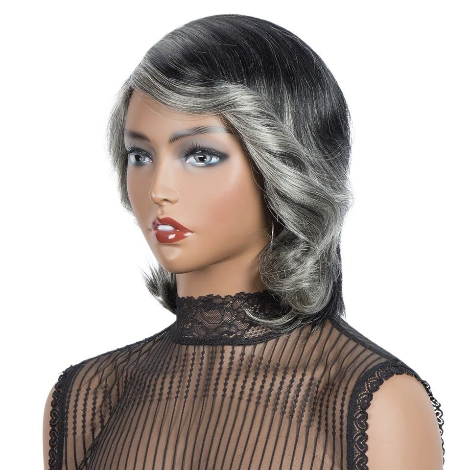 RitzWigs short wavy human hair wig in black and silver grey ombre with side-swept bangs on a mannequin head.