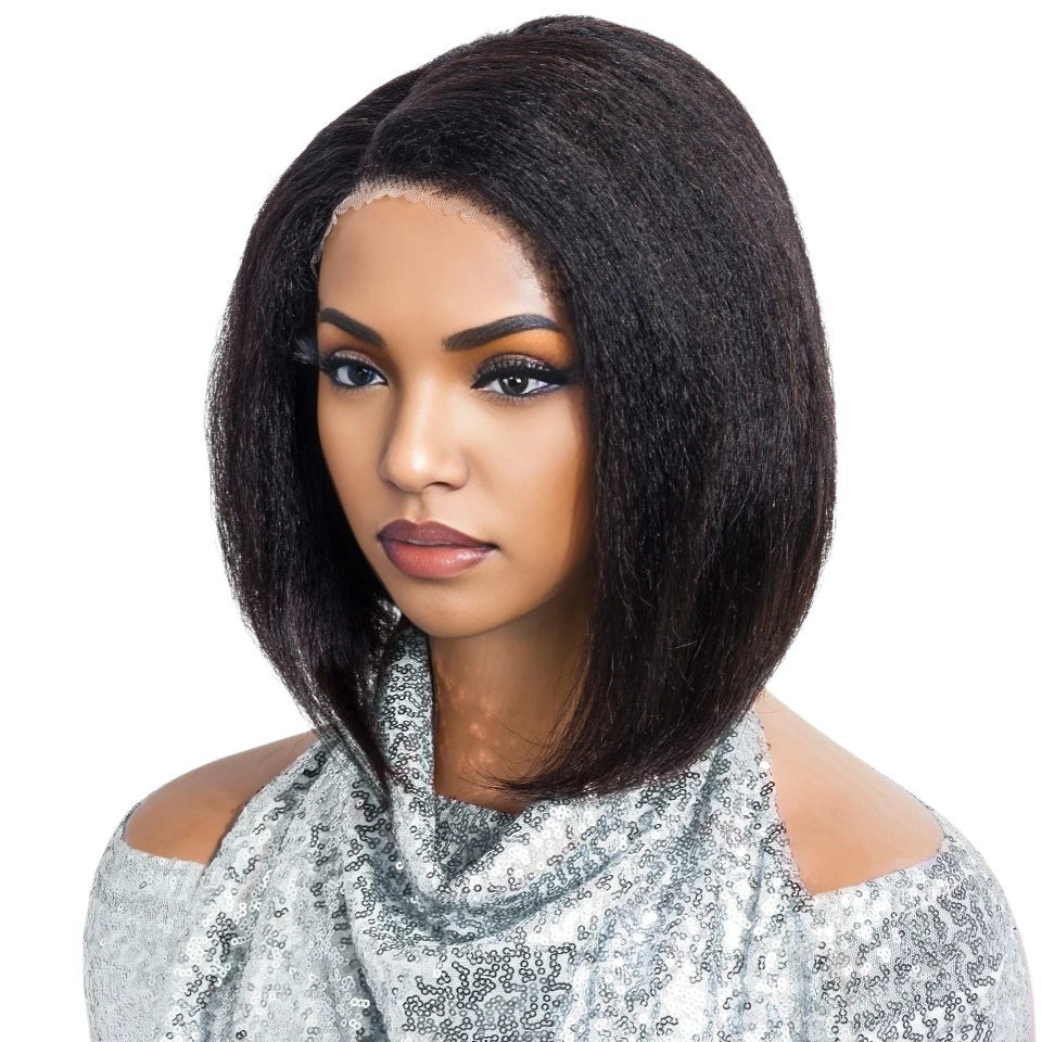 RitzWigs short Yaki straight Brazilian human hair lace wig with a left side part on a model wearing a sequin top.