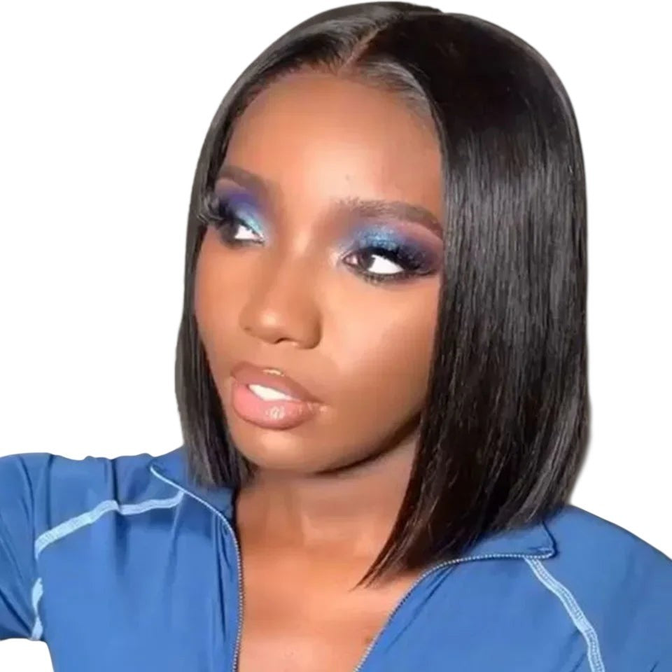 RitzWigs Brazilian straight black bob human hair wig with Swiss lace part on a model with blue eyeshadow