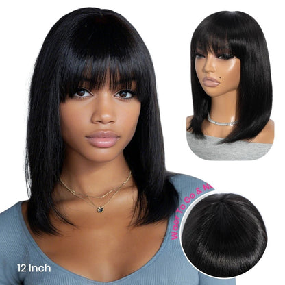RitzWigs straight black human hair bob wig with bangs worn by a model, featuring a natural glueless cap design.