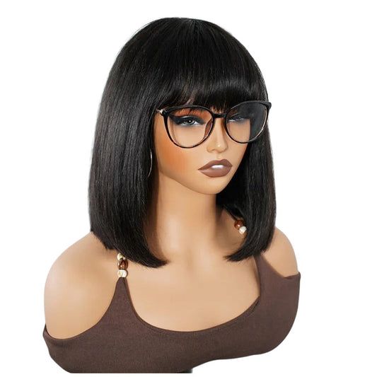 RitzWigs straight black bob human hair wig with bangs on a mannequin wearing glasses