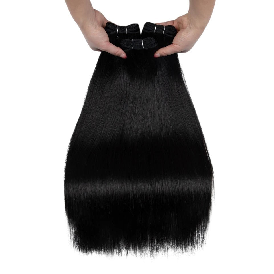 RitzWigs straight black human hair weave bundles with machine double weft construction held by hands