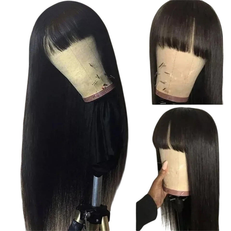 RitzWigs straight black human hair wig with bangs on a mannequin head, showing front and side views.