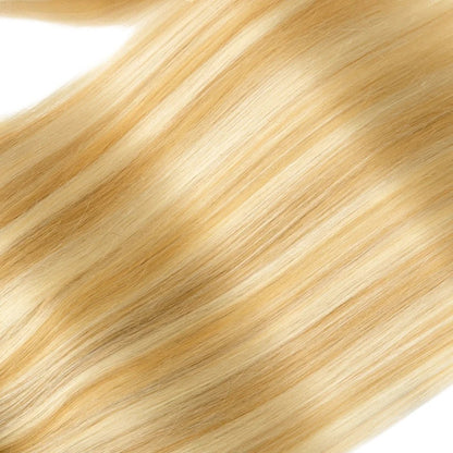 RitzWigs straight blonde human hair clip-in extensions with smooth texture and natural highlights