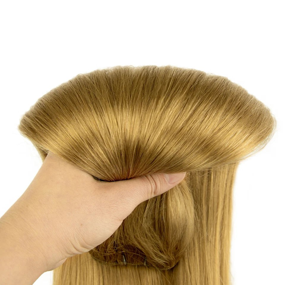 RitzWigs straight blonde human hair weft extension held in hand showing silky texture and reinforced construction