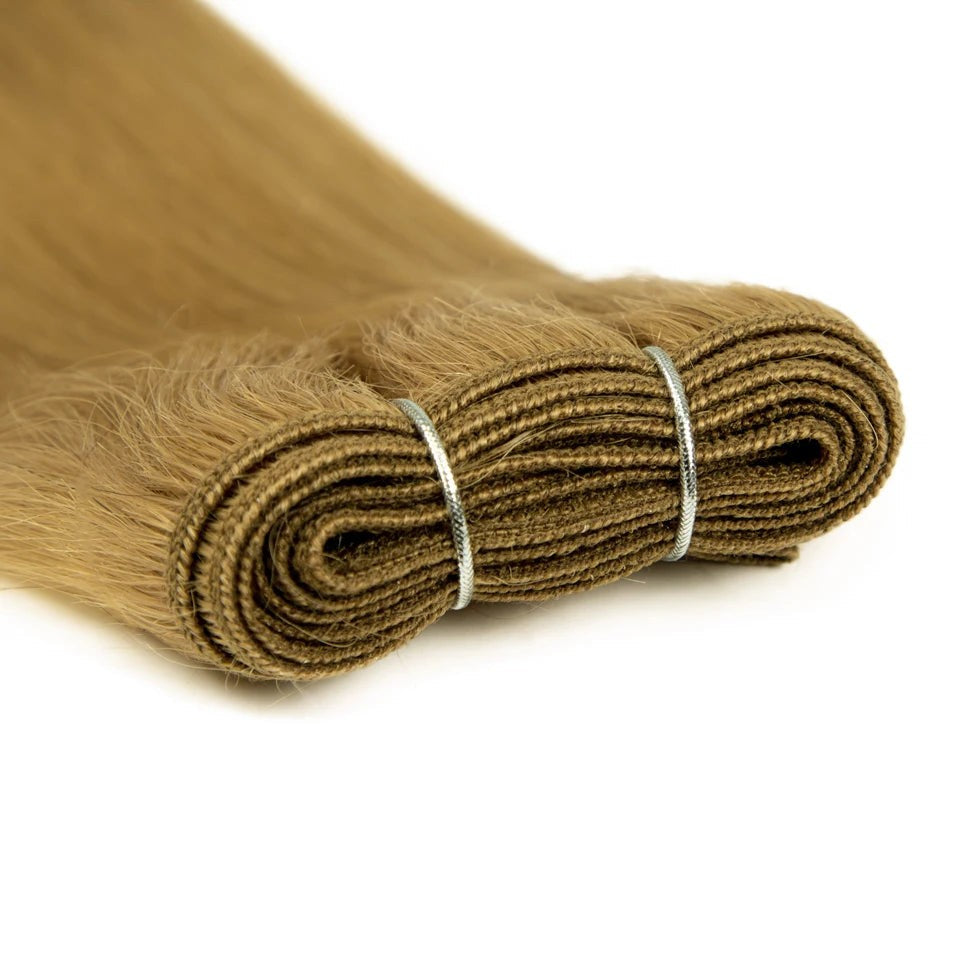 RitzWigs straight human hair weft extensions in a light golden blonde shade with a durable reinforced track.