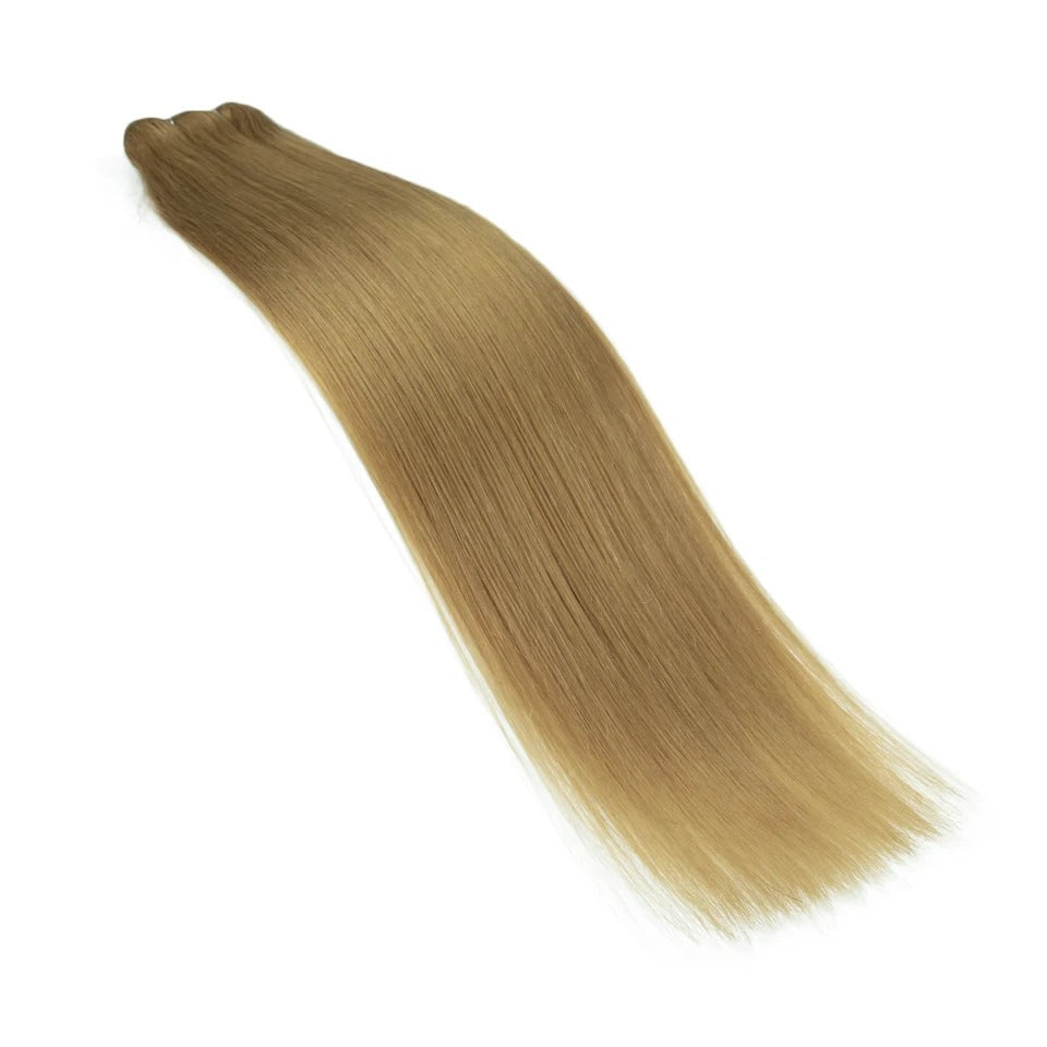 RitzWigs straight human hair weft extensions in a light golden blonde shade with a silky smooth finish.