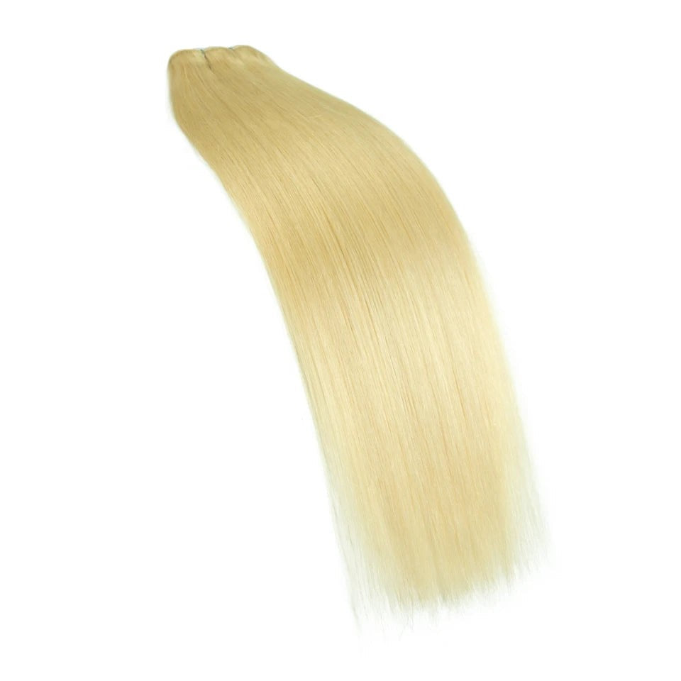 RitzWigs premium straight blonde human hair weft extensions with a silky, lustrous finish for added length and volume.