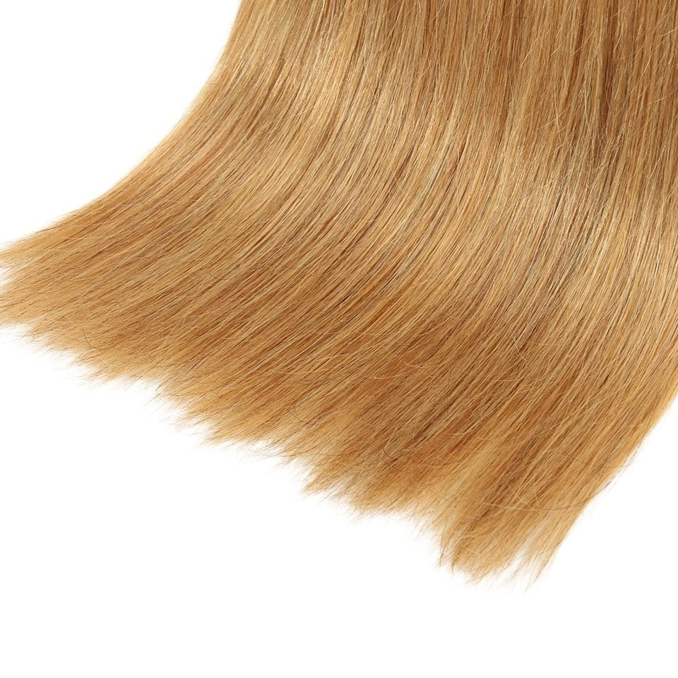 RitzWigs straight Brazilian human hair extensions in a warm brown 27 blonde shade with a smooth, silky texture.
