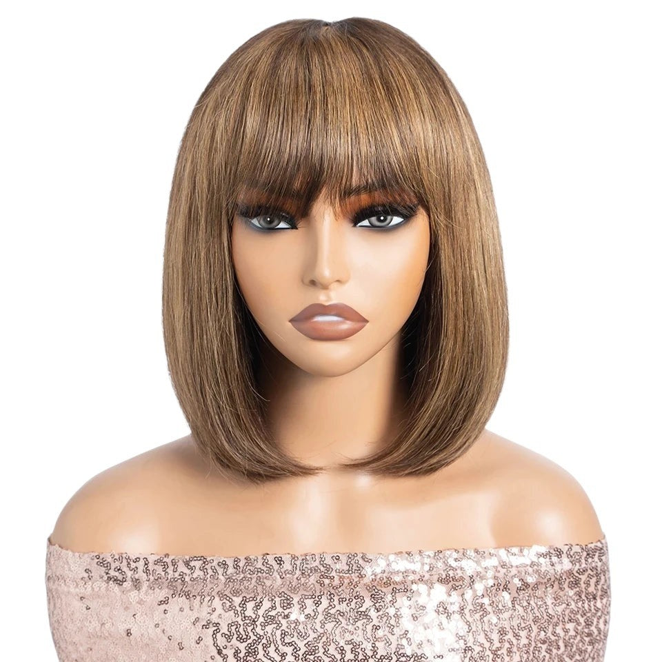 RitzWigs straight bob human hair wig with ombre brown and blonde tones on a mannequin head