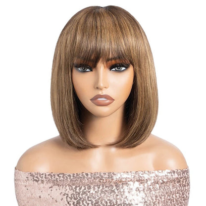 RitzWigs straight bob human hair wig with bangs in an ombre brown and blonde colour on a mannequin head