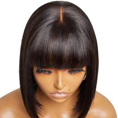 RitzWigs straight human hair bob wig with bangs and a realistic middle part on a mannequin head