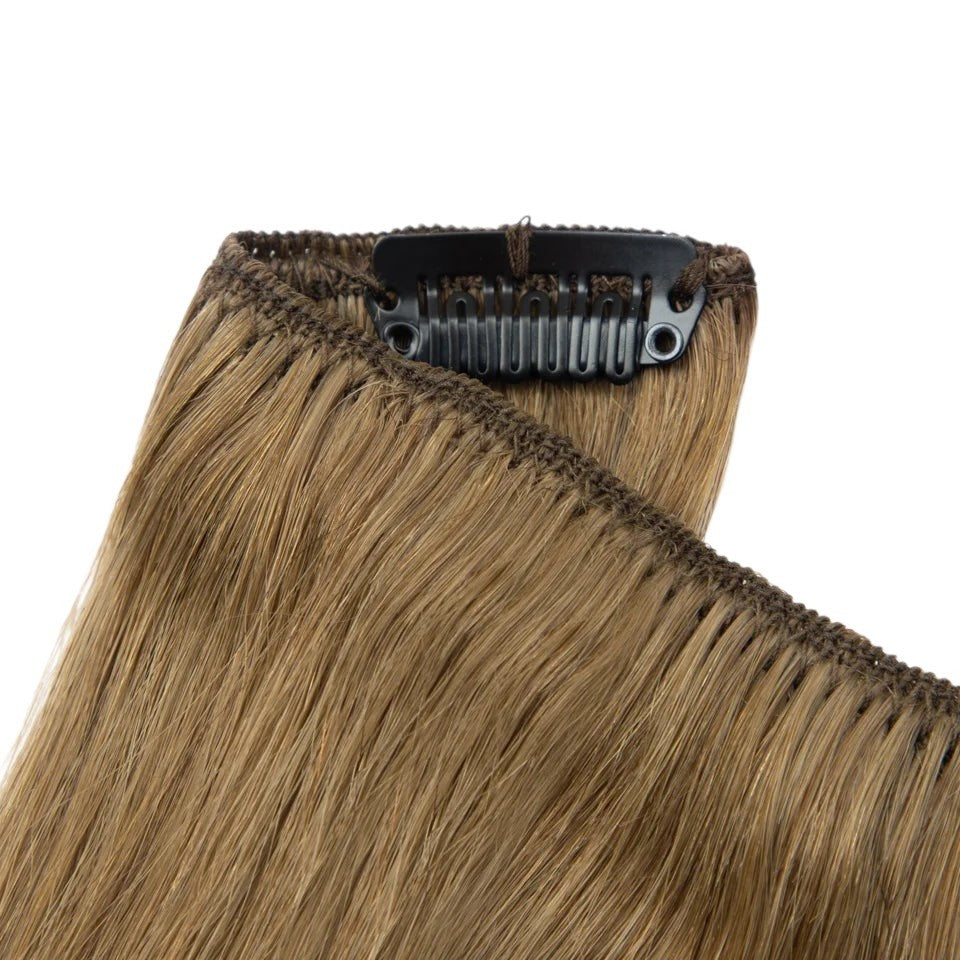 RitzWigs straight brown human hair extension weft with a secure black clip attachment