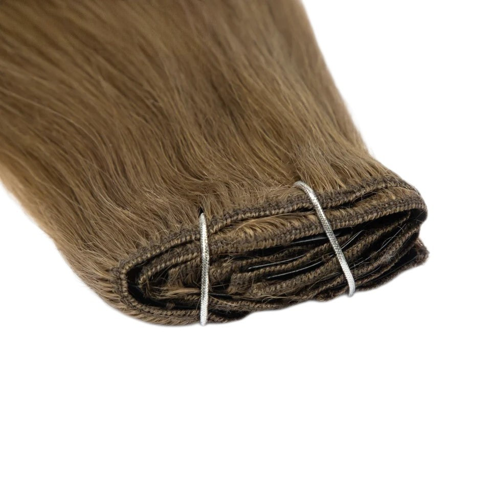 RitzWigs straight brown human hair extensions with secure clip-in weft design for added volume and length.