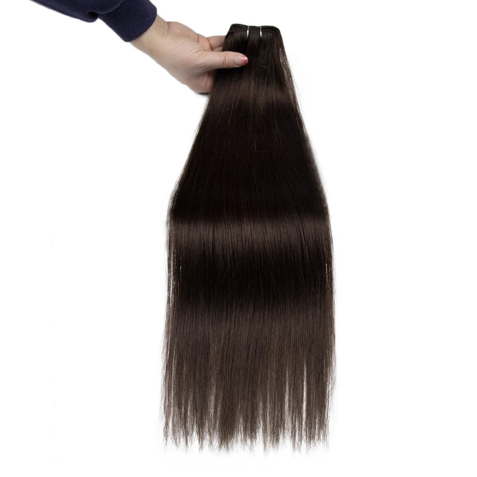 RitzWigs straight human hair weft extensions in a dark brown shade held by a hand against a white background