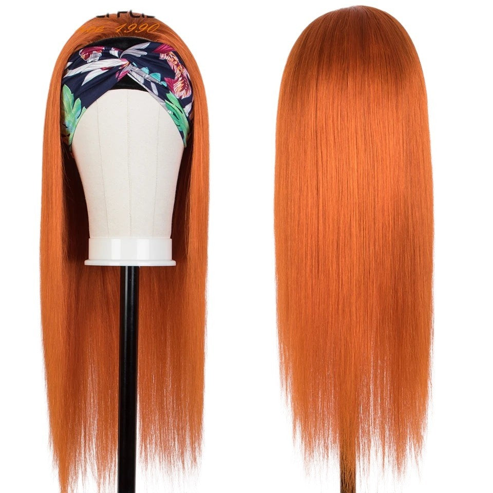 RitzWigs straight ginger orange human hair headband wig on a mannequin head with a floral patterned headband
