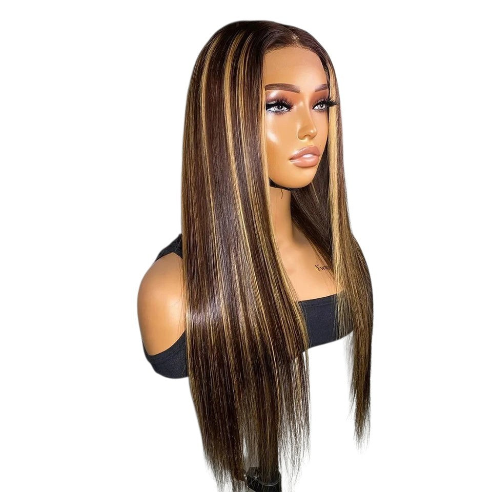 RitzWigs straight human hair wig with ginger orange and brown highlights on a mannequin head
