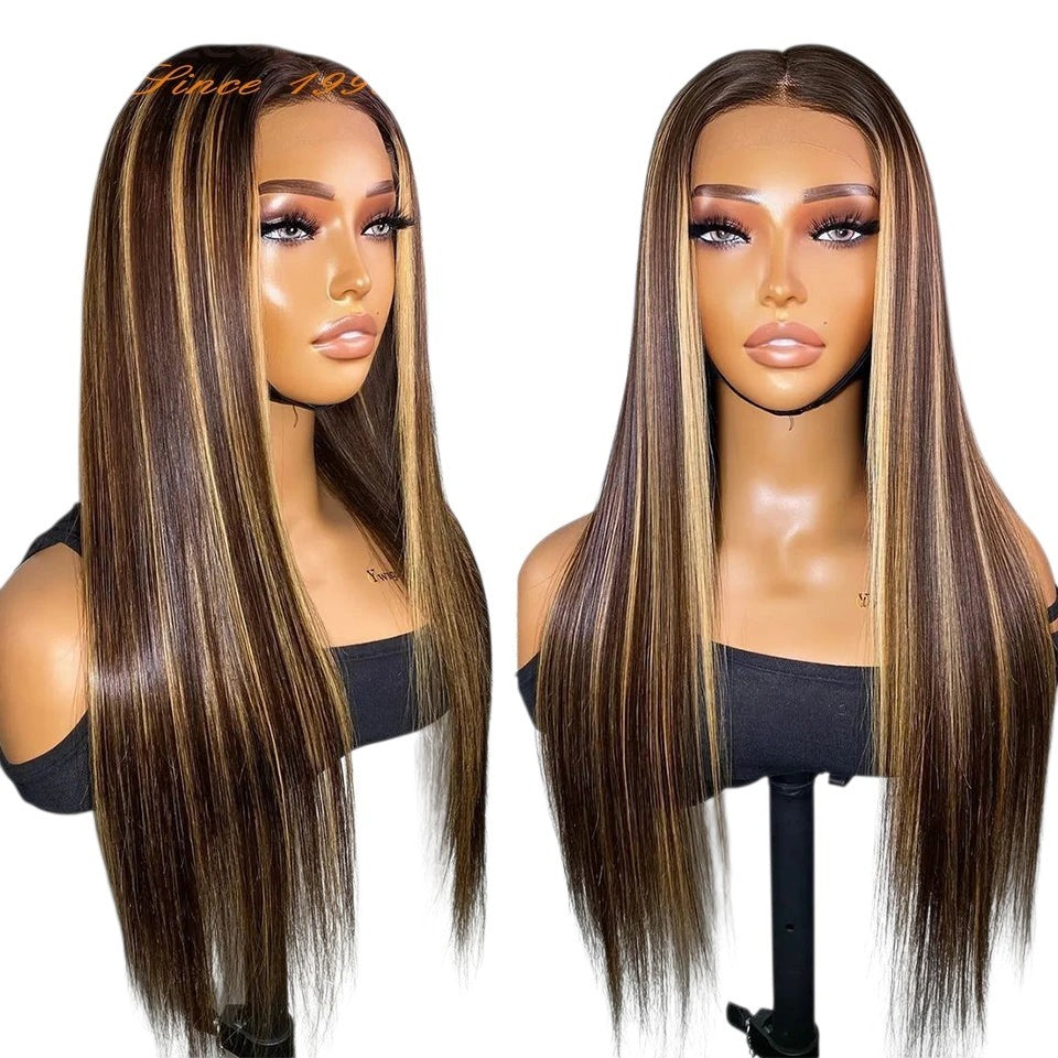 RitzWigs straight human hair wig with ginger orange and brown highlights, featuring a middle part and lace front.