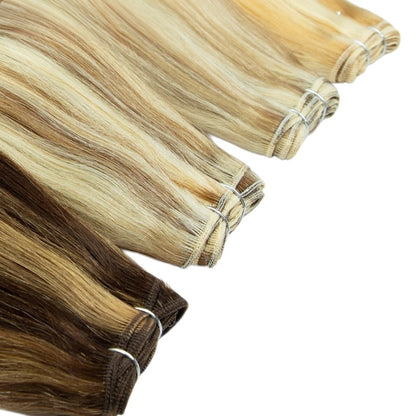 RitzWigs straight human hair weave bundles in various honey blonde and brown highlighted Remy hair shades